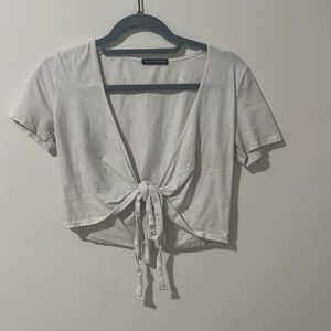 Brandy Melville white short sleeve wrap top